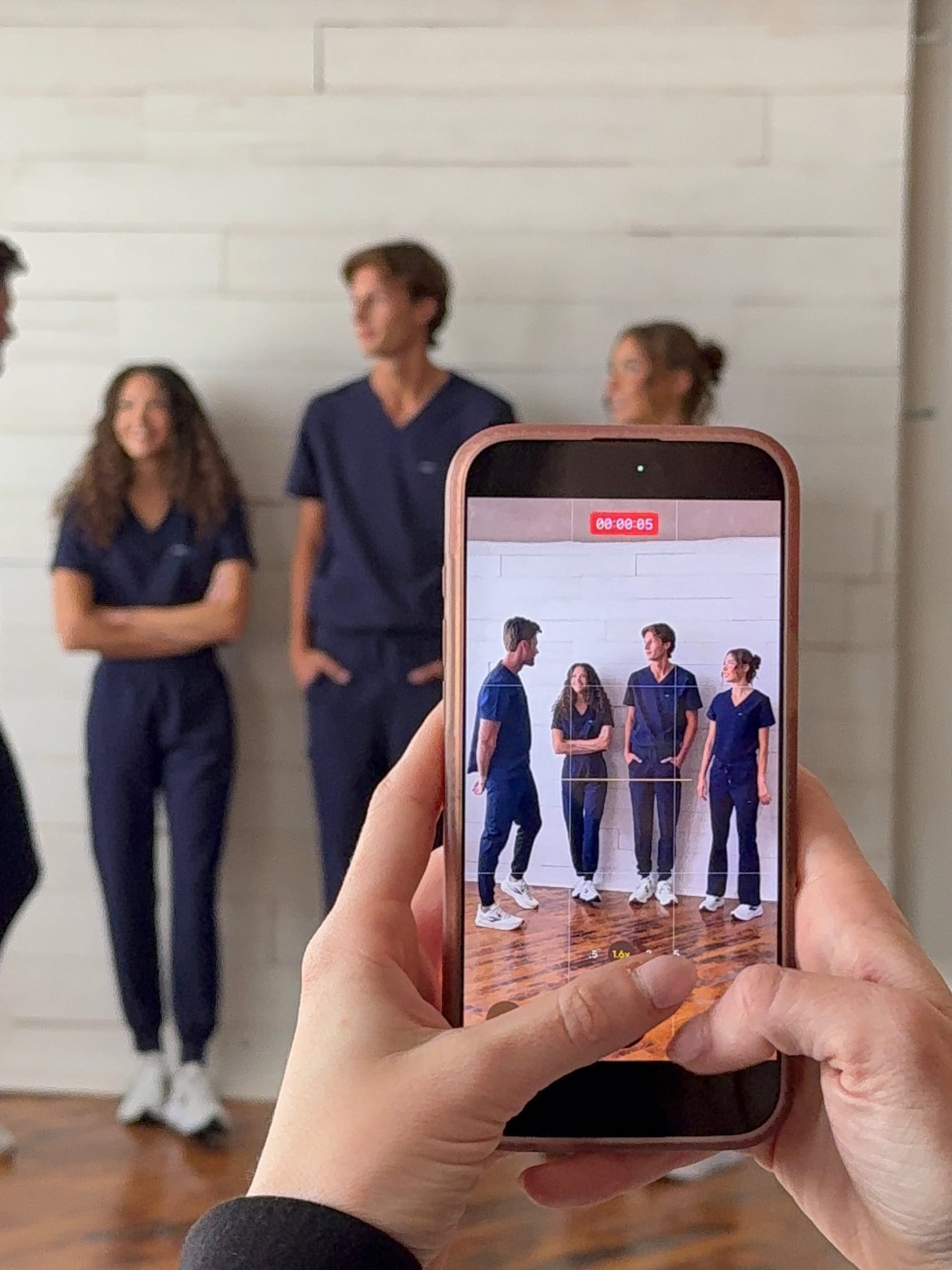 Behind the scenes image of The Social G Co at a Spirit Scrubs content shoot.